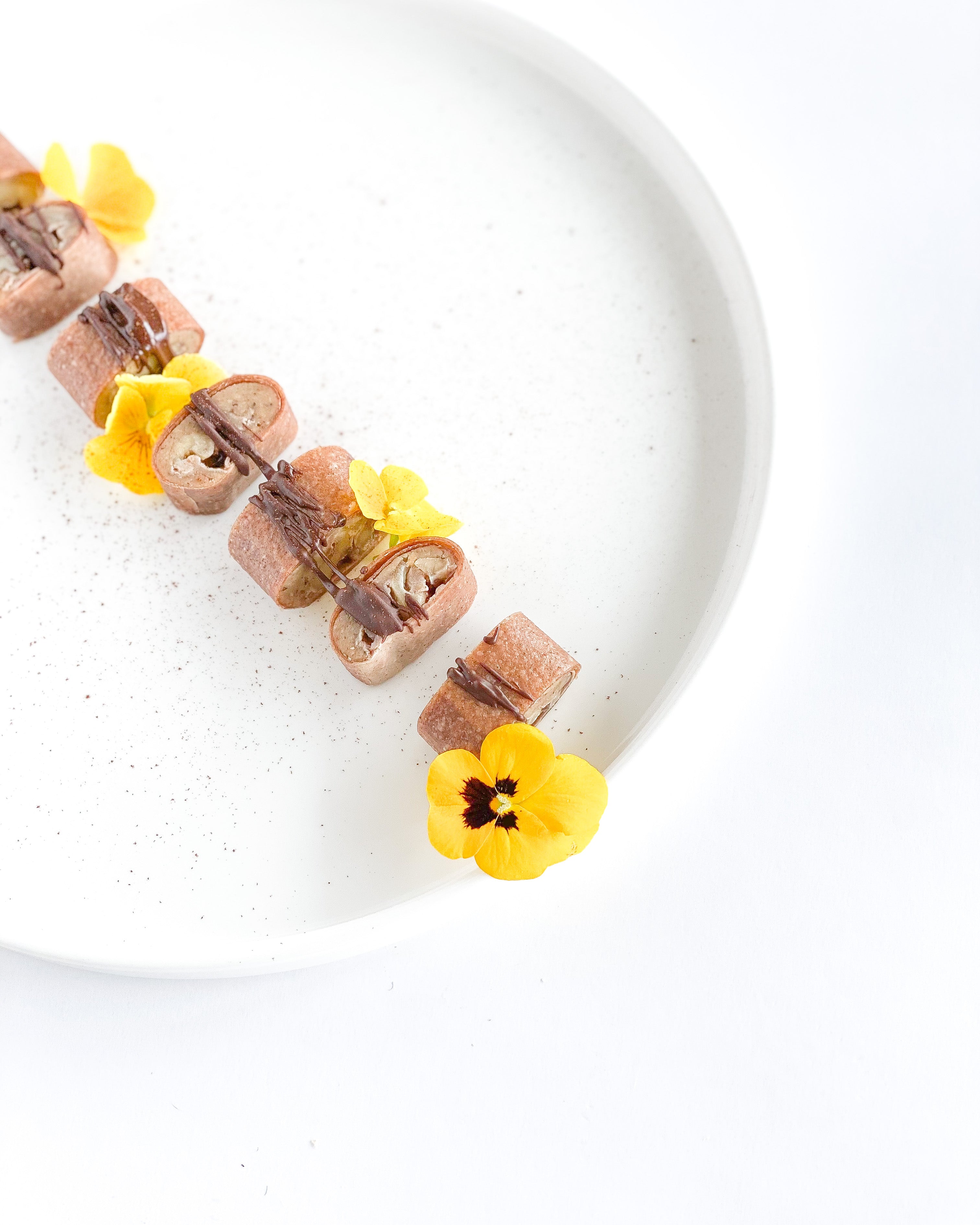 CINNAMON TAHINI FILLED COCONUT ROLLS