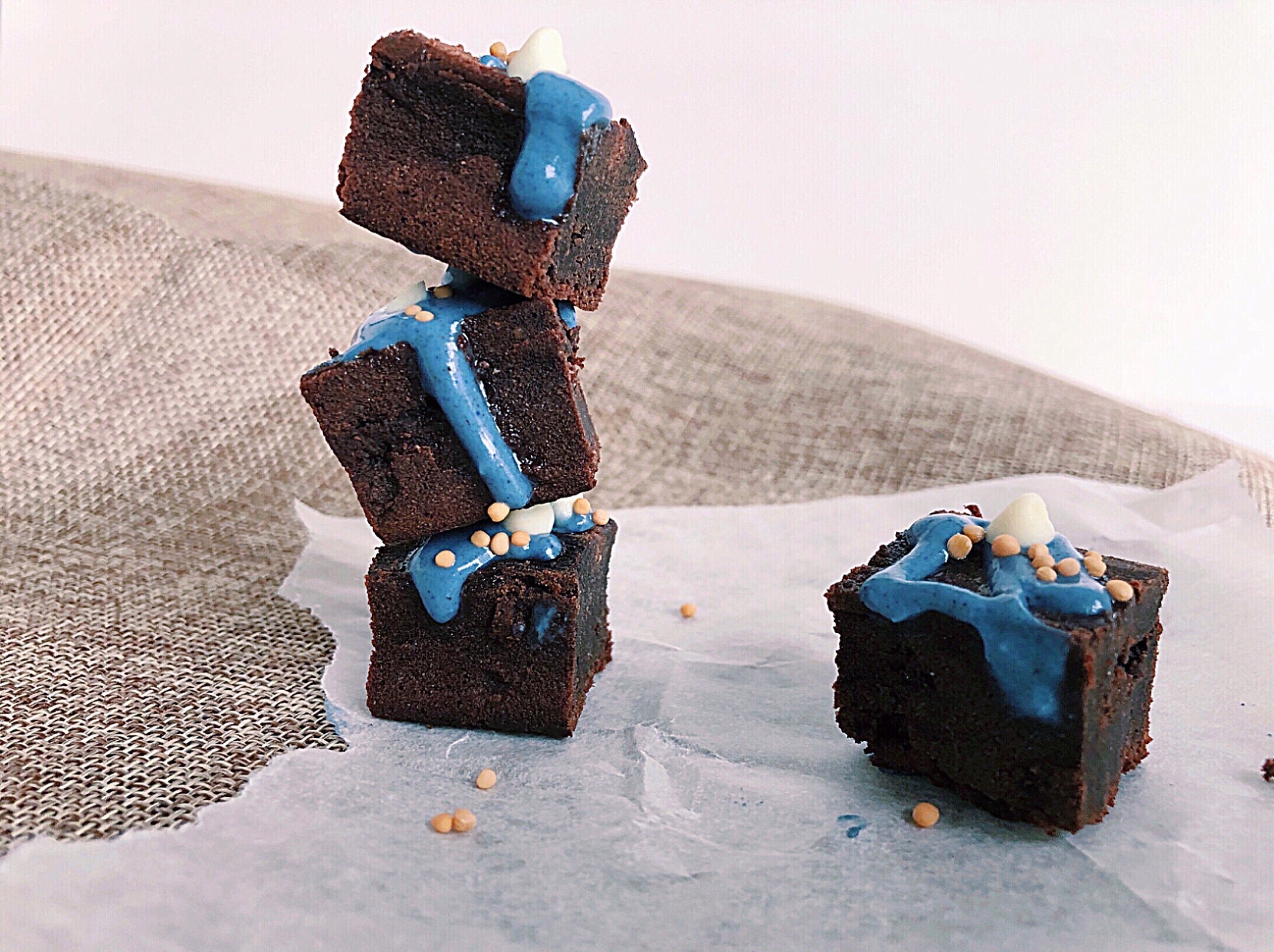 WALNUT BROWNIES WITH BLUE LATTE DRIZZLE